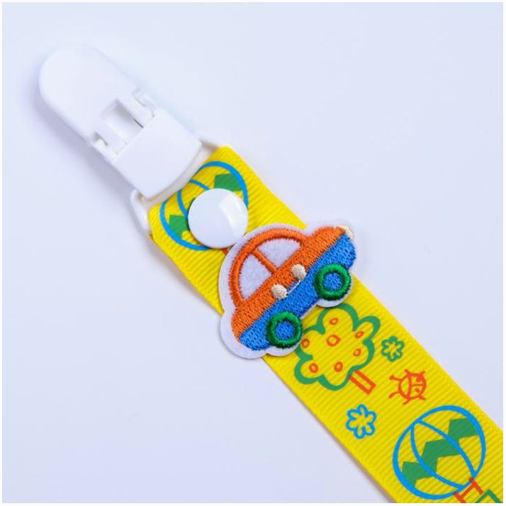 № 2792843 Держатель для соски - пустышки , ниблера «Мой первый транспорт» на ленте