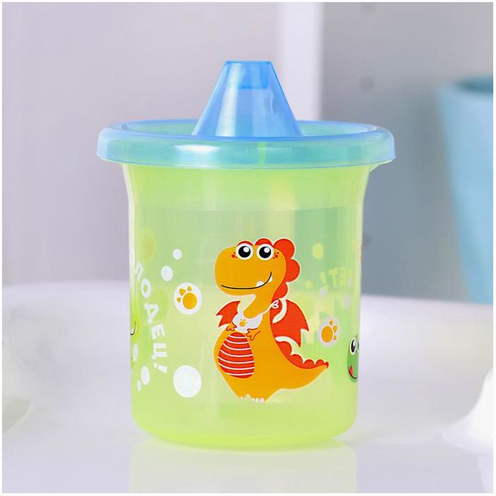 Картинка Поильник детский «Динозаврик Рикки» с твёрдым носиком 200 мл, цвет желтый/синий (№3721450) от магазина Мир детей Товары для Новорожденных