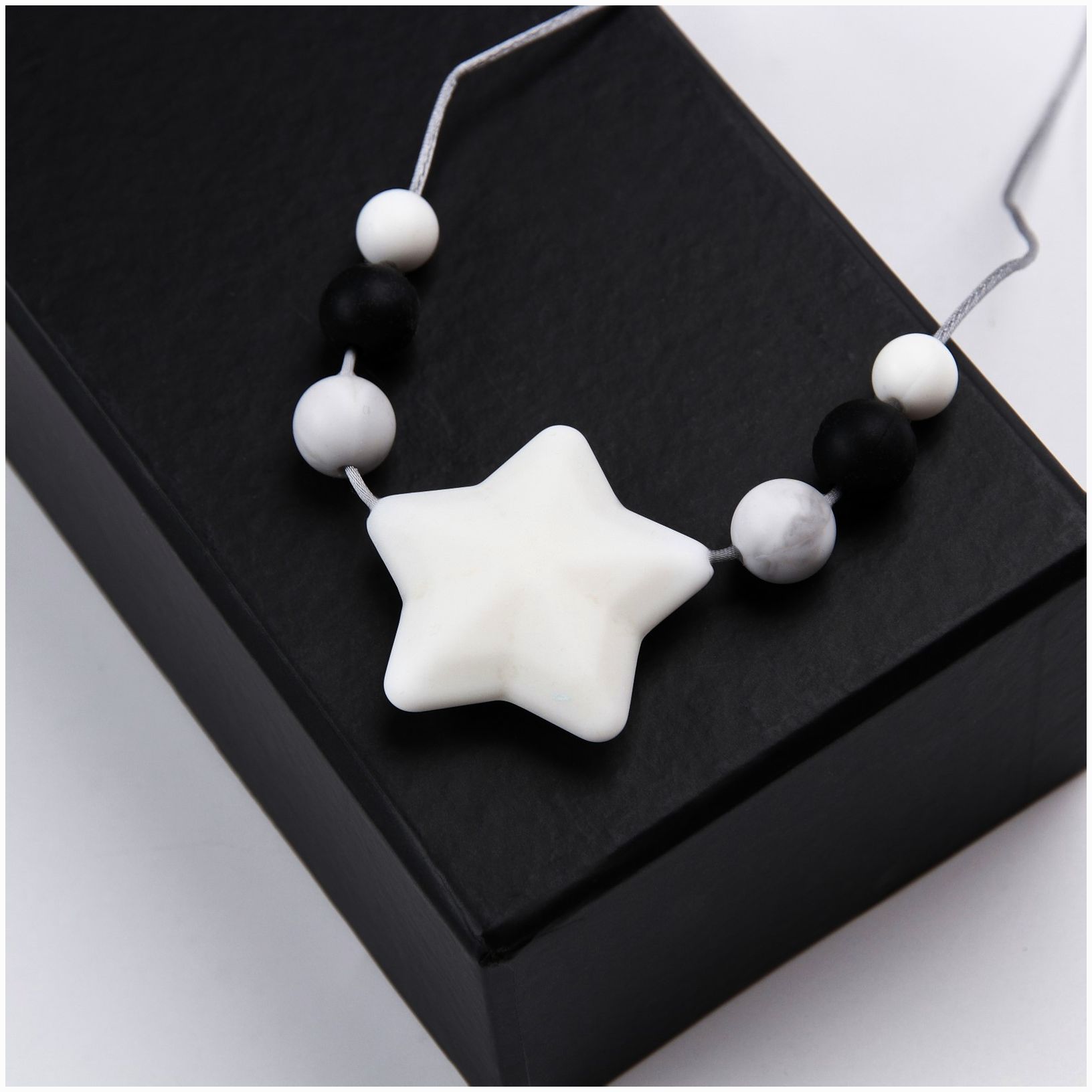 Картинка Слингобусы с прорезывателем Black&White (№7614582) от магазина Мир детей Товары для Новорожденных